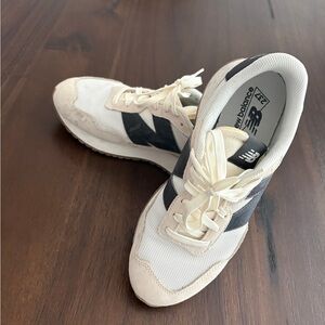 New Balance Cream and Black Athletic Shoes